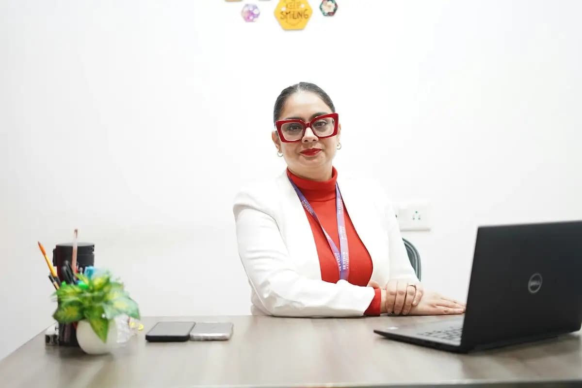 Insurance leader at her desk in a head office