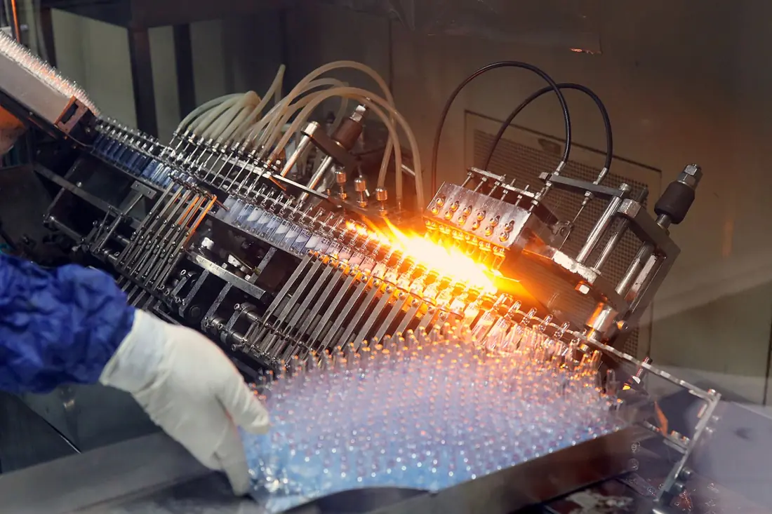 Ampoules being filled and sealed on a pharmaceutical line